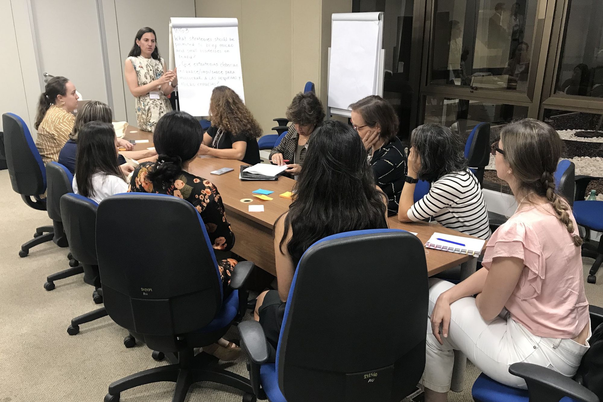 Subgroup of working group 3 discussing retail and food service food waste facilitated by Natalia Basso (consultant, Argentina).