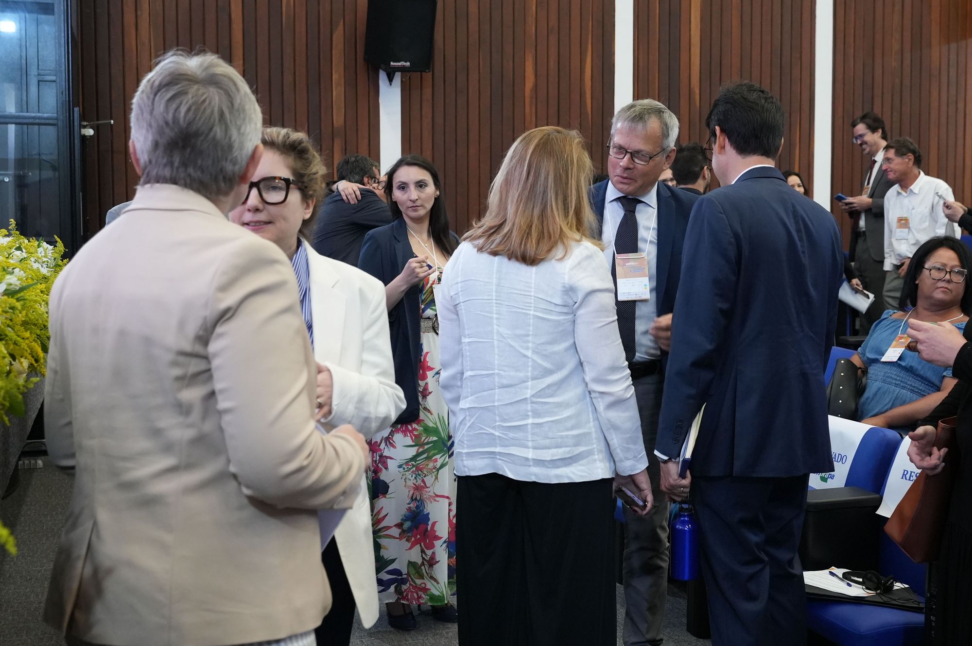 Networking among participants before the opening ceremony.