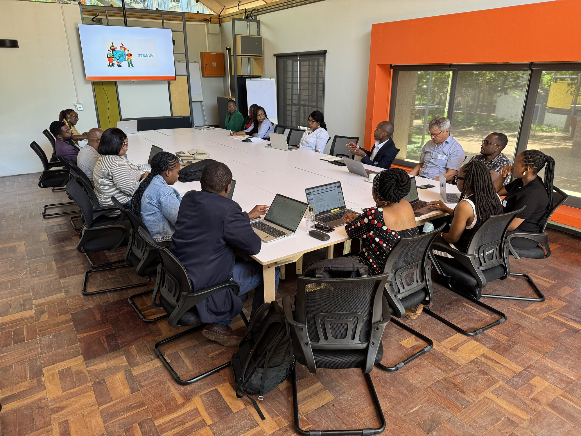 participants discussing at break out session #6