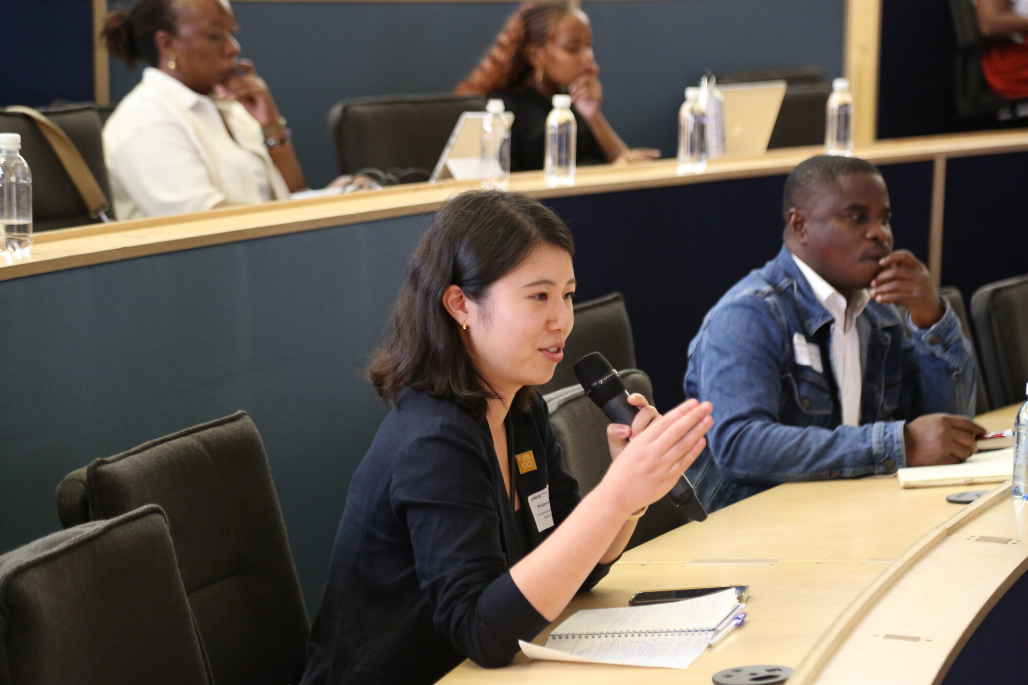 Kotone Yamamoto from Sustainable Development Solutions Network asking questions
